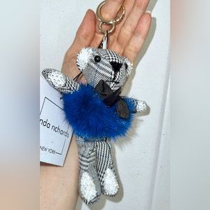 Brand new Linda Richards genuine Mink keychain, blue with black ribbon